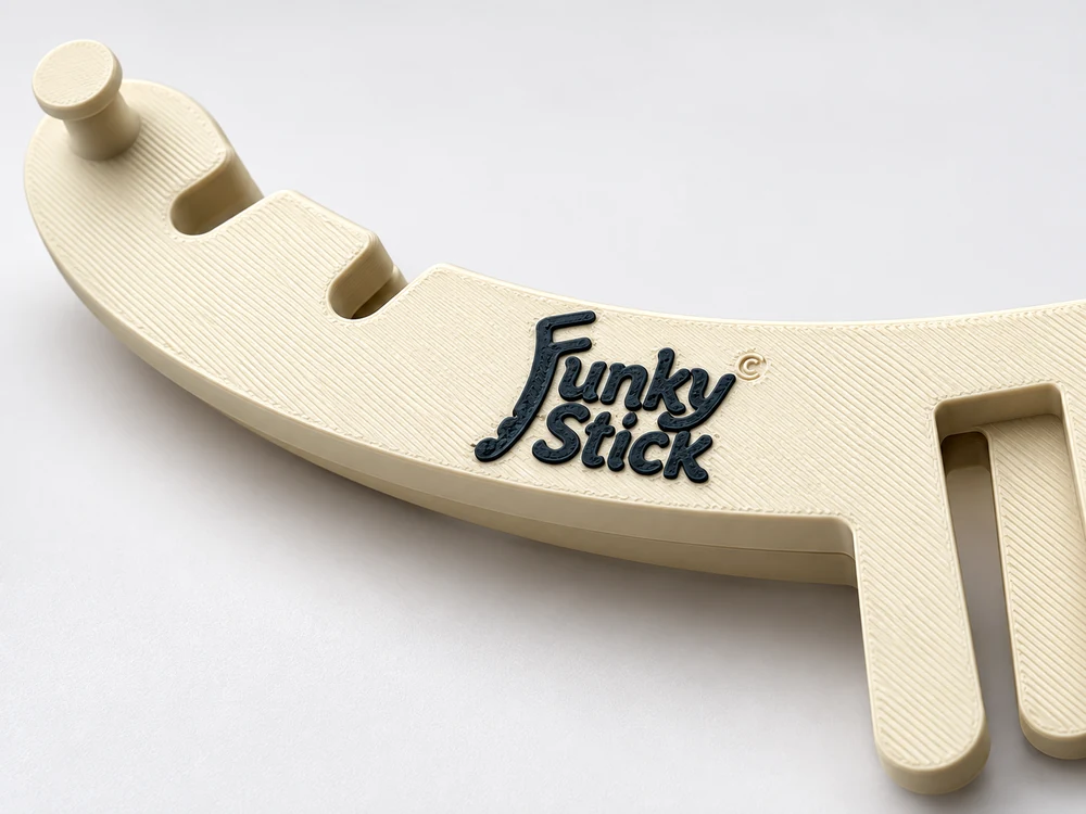 Close-up of the raised Funky Stick logo and 3D printed surface