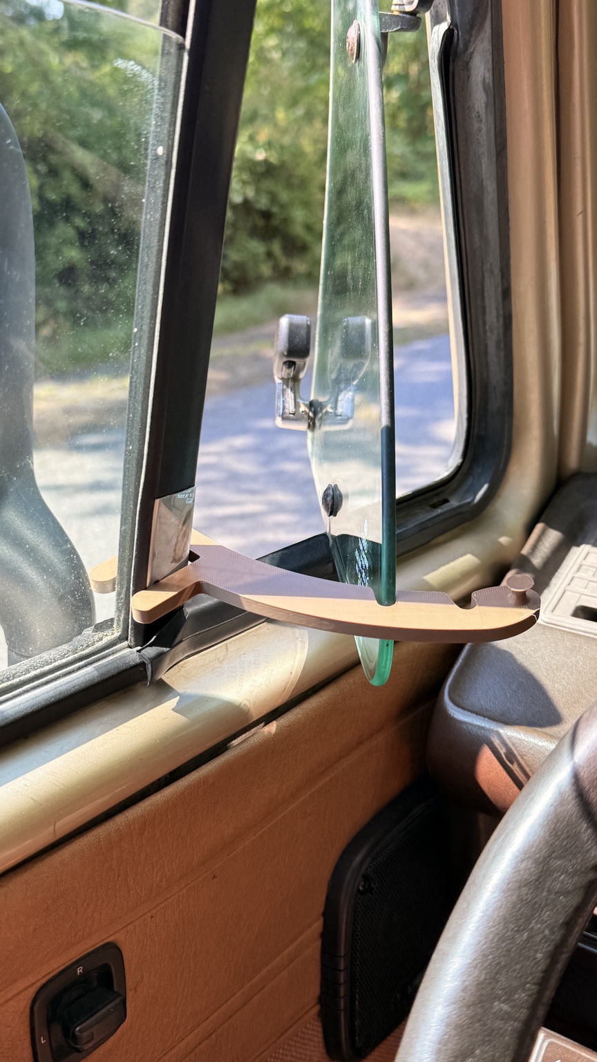 Funky Stick installed on a vehicle vent window