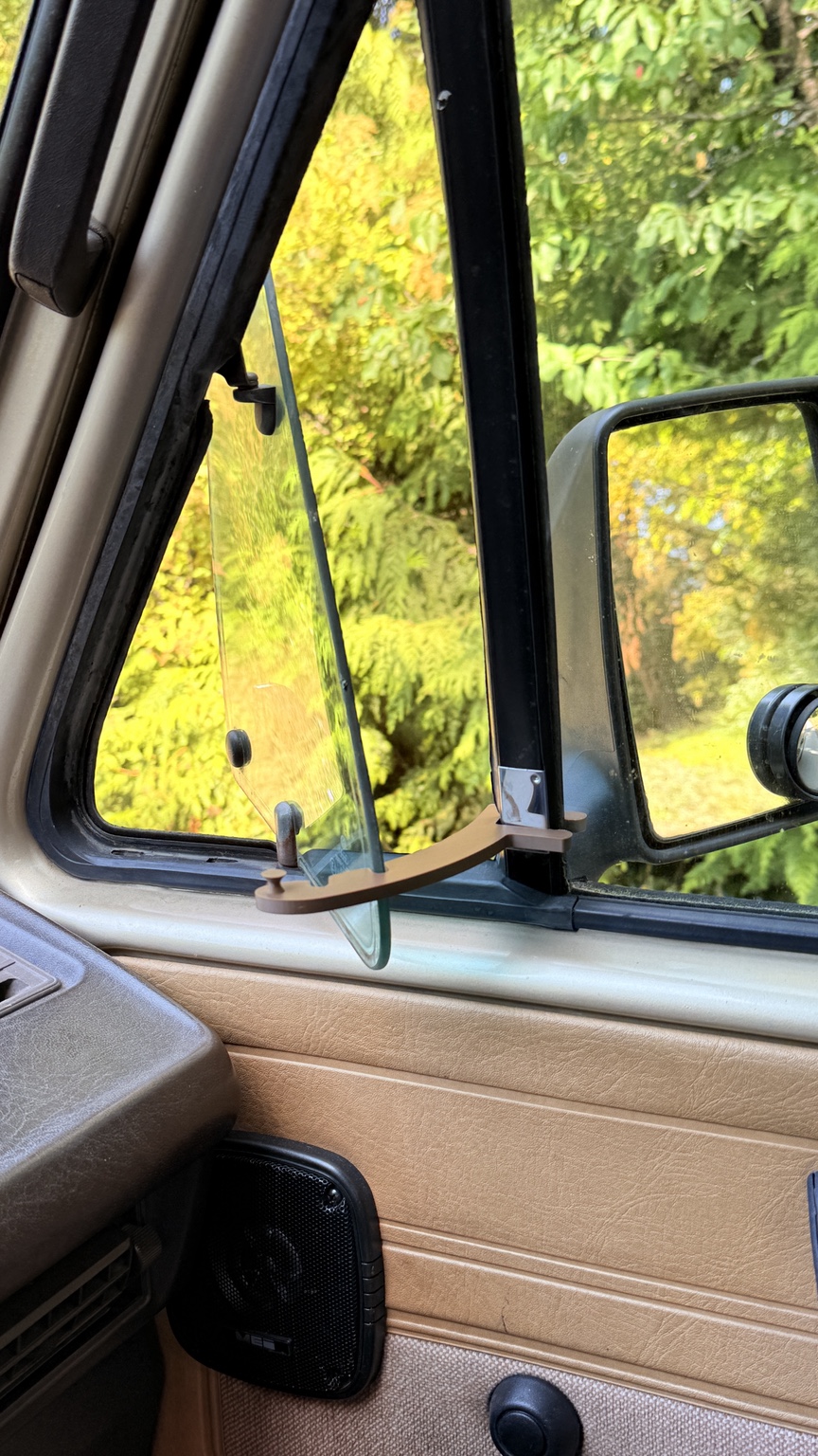 Funky Stick holding a vehicle vent window open