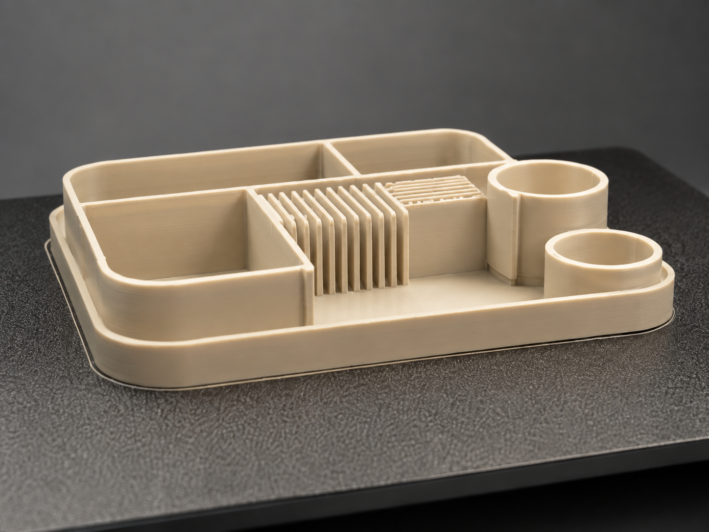 PLA 3D printed modular organizer on a printer bed