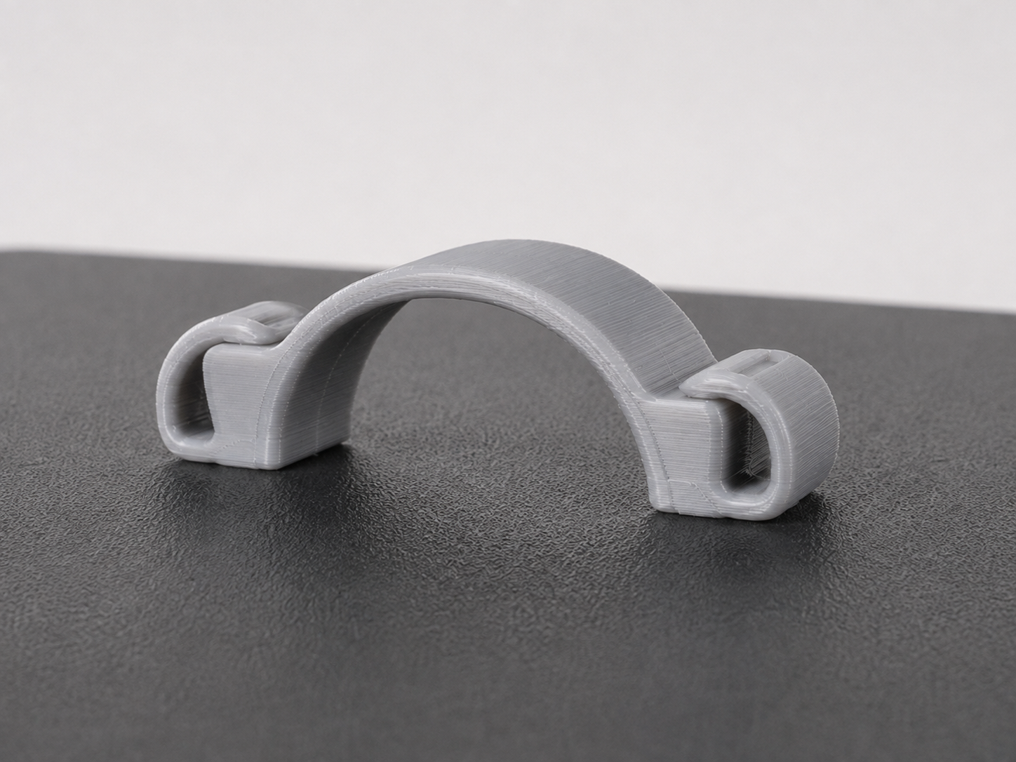 TPU 3D printed arch clip on a printer bed